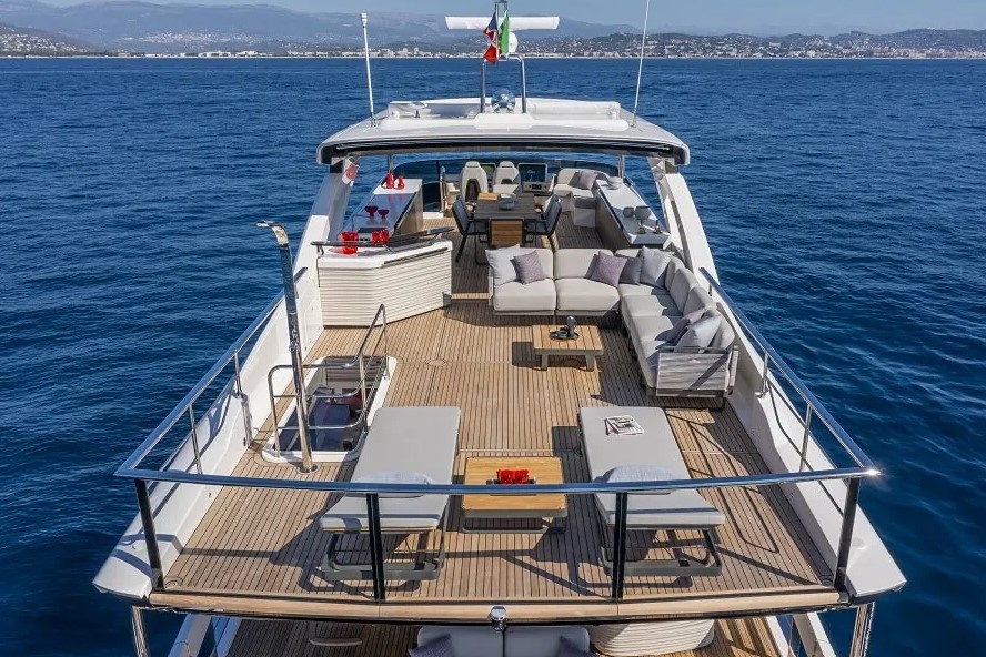 The enormous flybridge has sun loungers, L-shaped sofa, covered dining, helm and more seating forward